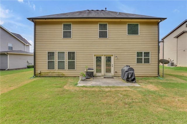 1354 Slate Bend Dr, Dacula, GA 30019 - rear view of property featuring central air condition unit, a patio, and a yard