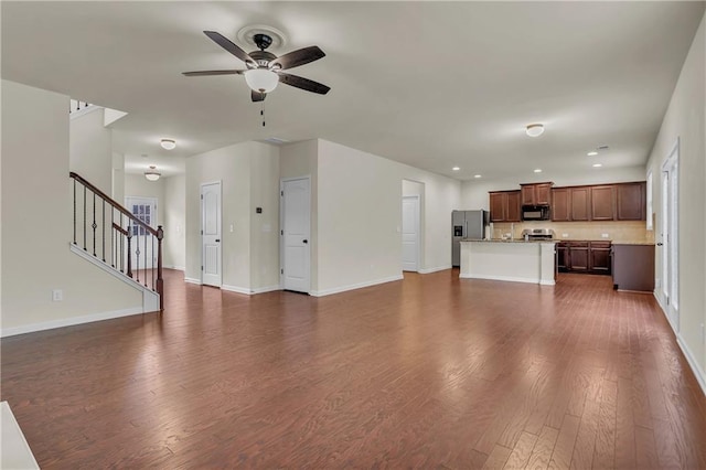 1354 Slate Bend Dr, Dacula, GA 30019 - unfurnished living room featuring dark hardwood / wood-style floors and ceiling fan