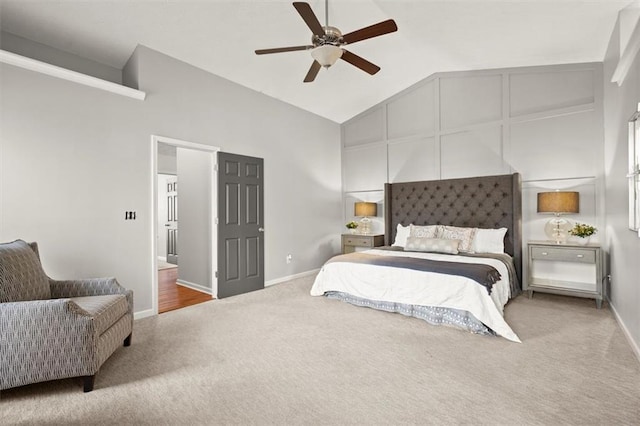 bedroom with ceiling fan, carpet floors, high vaulted ceiling, and baseboards