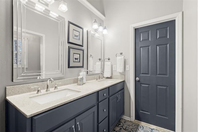 bathroom featuring double vanity and a sink