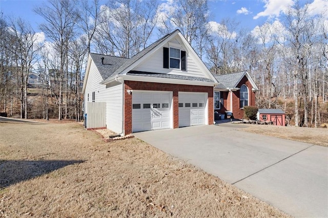 view of property exterior with a garage, brick siding, driveway, a yard, and roof with shingles