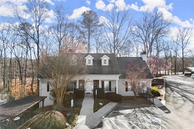 view of front of property with a chimney