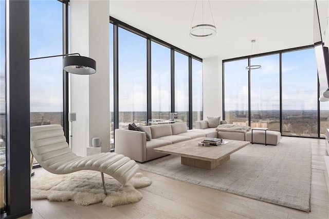 788 W Marietta St Unit 1809, Atlanta, GA 30318 - living area featuring floor to ceiling windows and wood finished floors