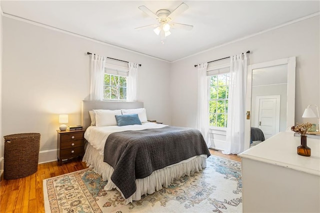 67 Trammell St SW, Marietta, GA 30064 - bedroom with crown molding, wood finished floors, and a ceiling fan