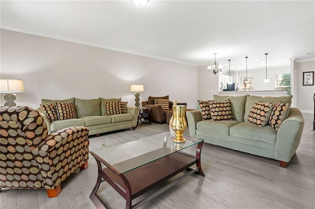 286 Blue Pointe Ct, Suwanee, GA 30024 - living room with a chandelier, wood finished floors, ornamental molding, and baseboards