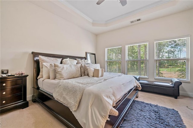 286 Blue Pointe Ct, Suwanee, GA 30024 - bedroom featuring light carpet, ornamental molding, a raised ceiling, a ceiling fan, and baseboards