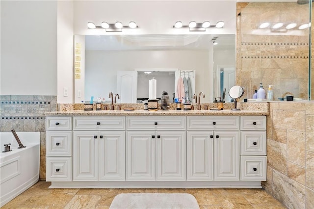 286 Blue Pointe Ct, Suwanee, GA 30024 - full bathroom with a bath, double vanity, a tile shower, tile walls, and ornamental molding