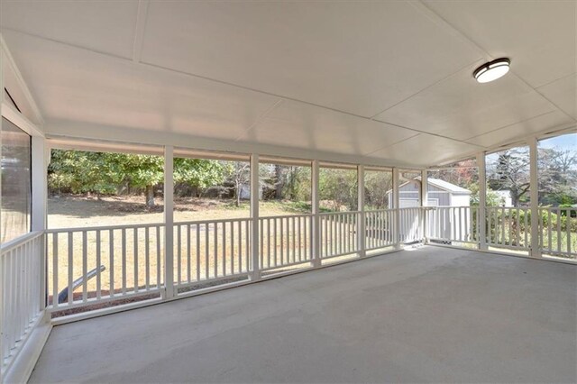 unfurnished sunroom with a wealth of natural light