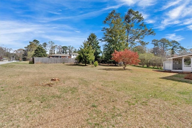 view of yard with fence