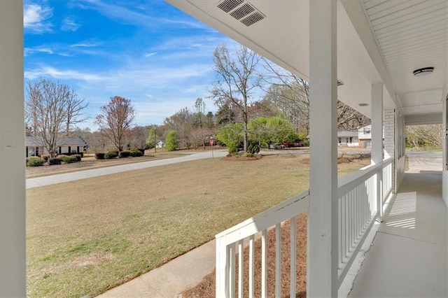 view of patio featuring visible vents and covered porch