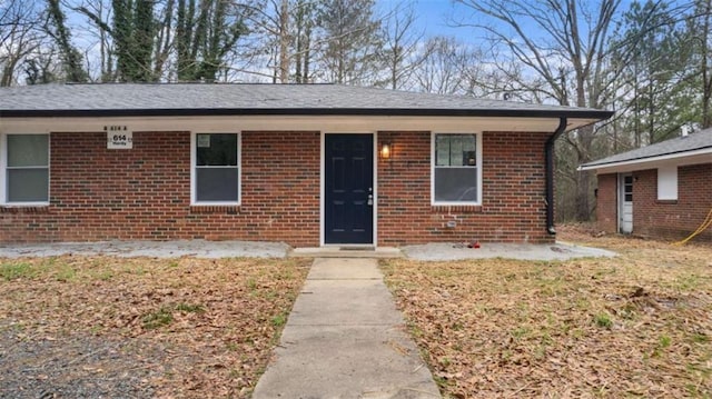 view of front of property with brick siding