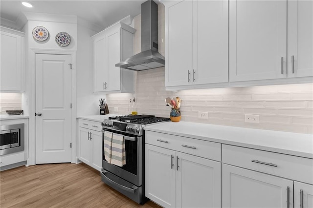 300 Olmstead Way, Alpharetta, GA 30022 - kitchen featuring stainless steel appliances, wall chimney exhaust hood, light countertops, white cabinetry, and backsplash