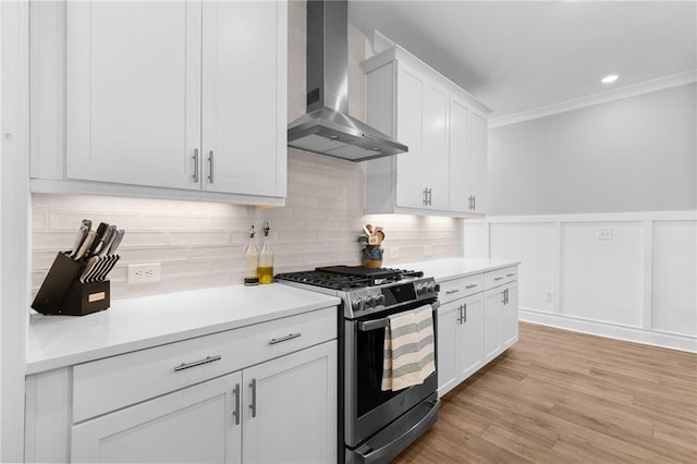 300 Olmstead Way, Alpharetta, GA 30022 - kitchen featuring stainless steel gas range oven, wall chimney range hood, light countertops, white cabinetry, and tasteful backsplash