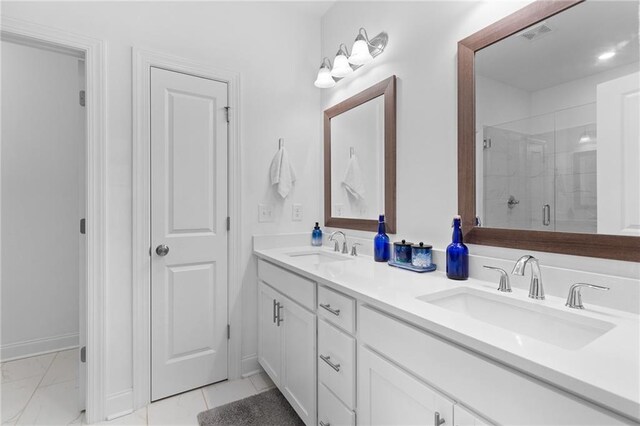 300 Olmstead Way, Alpharetta, GA 30022 - bathroom with a shower stall, double vanity, marble look tile flooring, and baseboards