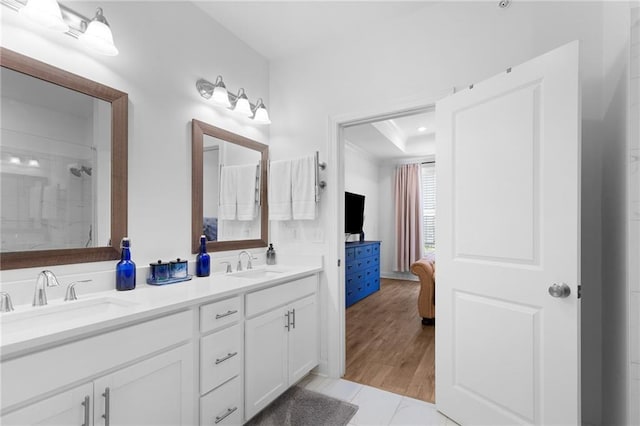 300 Olmstead Way, Alpharetta, GA 30022 - bathroom featuring a shower, a tray ceiling, double vanity, and ensuite bathroom