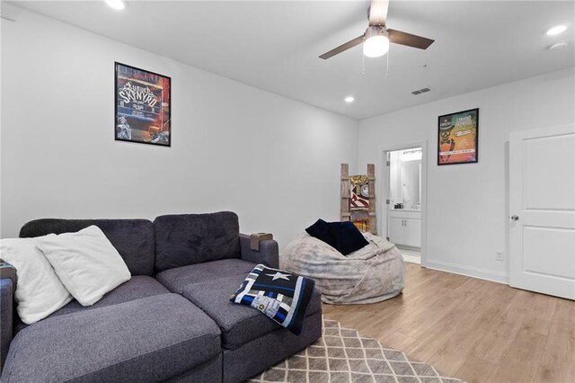 300 Olmstead Way, Alpharetta, GA 30022 - living area with a ceiling fan, recessed lighting, light wood-style floors, and baseboards