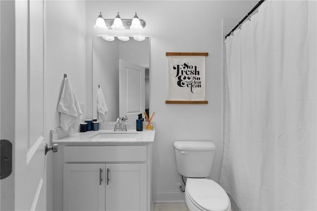 300 Olmstead Way, Alpharetta, GA 30022 - bathroom with toilet, vanity, baseboards, and curtained shower