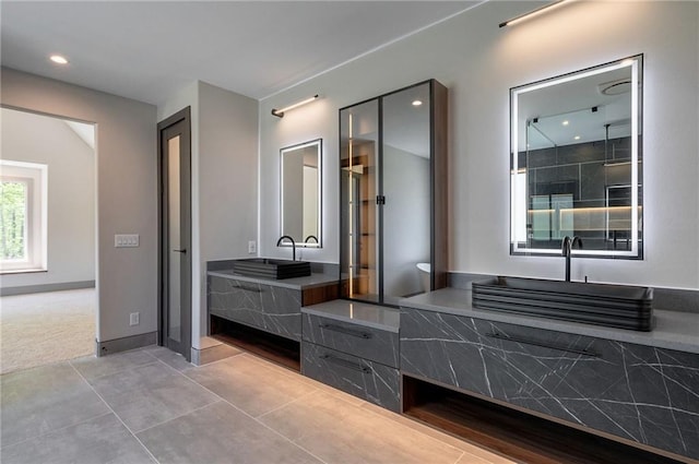 full bathroom with recessed lighting, vanity, a stall shower, and tile patterned floors