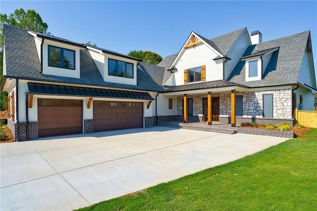modern inspired farmhouse featuring roof with shingles, an attached garage, stone siding, a porch, and driveway