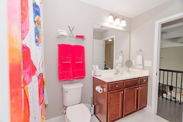 full bath featuring vanity, toilet, baseboards, and tile patterned floors