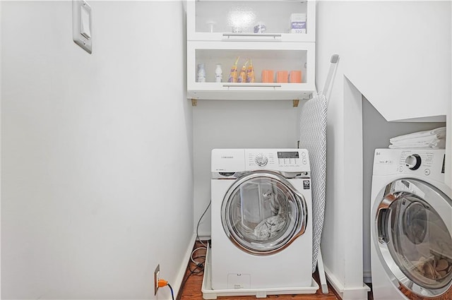 laundry area featuring washing machine and dryer