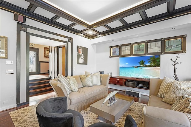 living room with beamed ceiling, ornamental molding, hardwood / wood-style flooring, and coffered ceiling