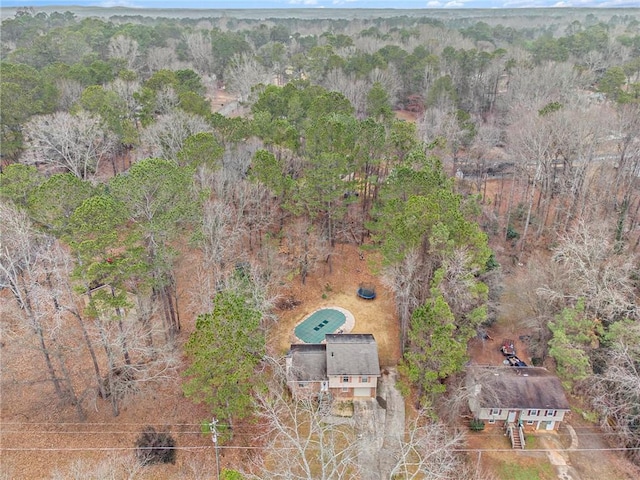 aerial view featuring a view of trees