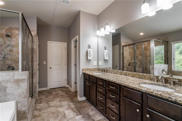 4305 Hunters Walk Way, Cumming, GA 30028 - bathroom featuring a stall shower, double vanity, baseboards, a tub, and stone finish floors