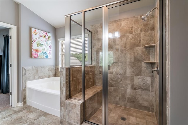 4305 Hunters Walk Way, Cumming, GA 30028 - bathroom with a bath, a stall shower, and vaulted ceiling