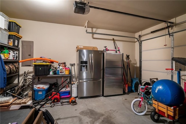 4305 Hunters Walk Way, Cumming, GA 30028 - garage with stainless steel refrigerator with ice dispenser, freestanding refrigerator, electric panel, and a garage door opener