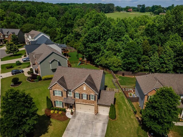 4305 Hunters Walk Way, Cumming, GA 30028 - aerial perspective of suburban area with a forest