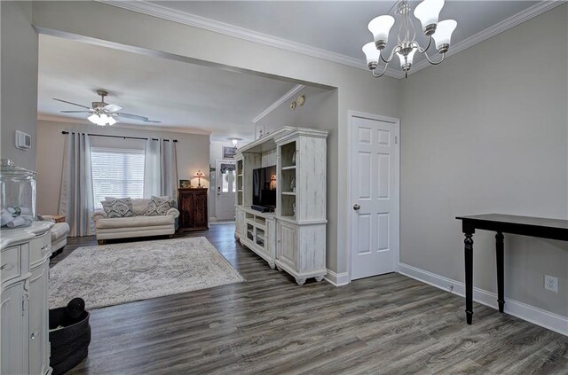 living room with ornamental molding and dark hardwood / wood-style flooring