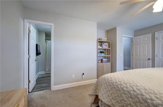 carpeted bedroom with ceiling fan