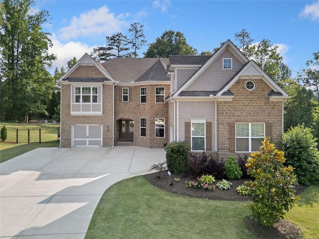 2385 Saddle Brook Trce, Cumming, GA 30040 - view of front of home featuring concrete driveway, a garage, and stone siding