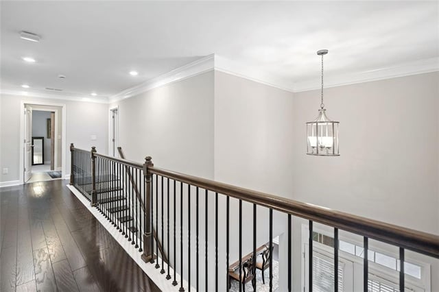2385 Saddle Brook Trce, Cumming, GA 30040 - corridor featuring an upstairs landing, hardwood / wood-style flooring, a chandelier, crown molding, and recessed lighting