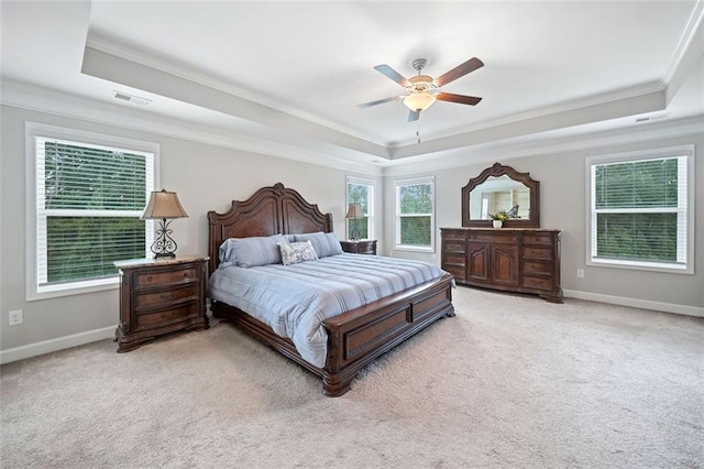 2385 Saddle Brook Trce, Cumming, GA 30040 - bedroom with a tray ceiling, ornamental molding, light carpet, baseboards, and ceiling fan