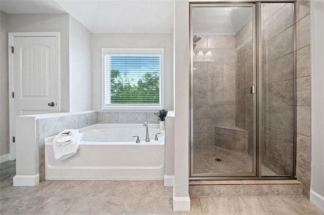 2385 Saddle Brook Trce, Cumming, GA 30040 - full bath with a bath, a stall shower, and baseboards