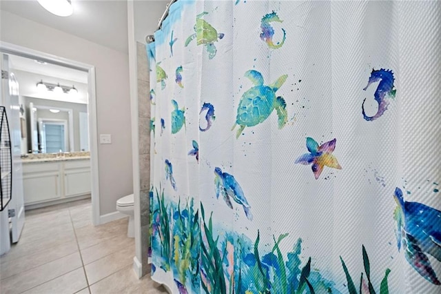 2385 Saddle Brook Trce, Cumming, GA 30040 - bathroom with toilet, vanity, tile patterned floors, and a shower with shower curtain