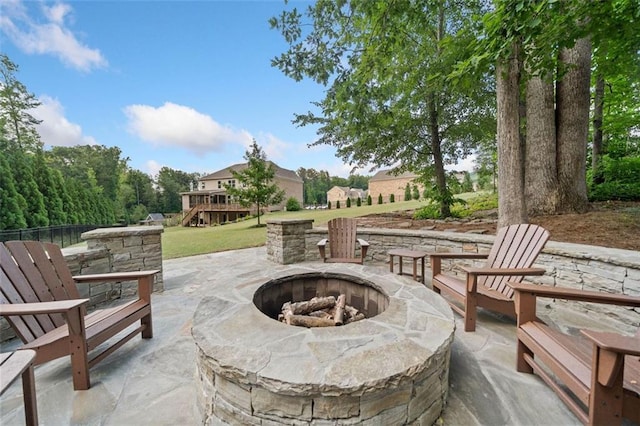 2385 Saddle Brook Trce, Cumming, GA 30040 - view of patio / terrace with an outdoor fire pit