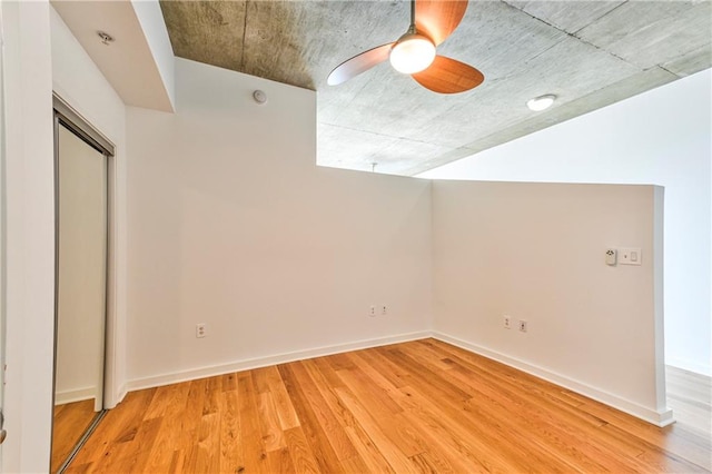 interior space featuring ceiling fan and light hardwood / wood-style flooring