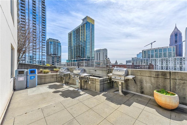 view of patio featuring an outdoor kitchen and area for grilling