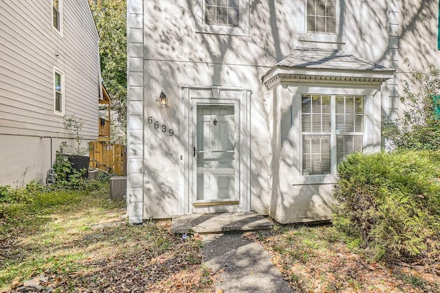 property entrance featuring central AC