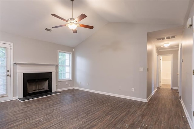 5069 Jonesboro Rd, Union City, GA 30291 - unfurnished living room with dark wood-type flooring, a ceiling fan, a fireplace with raised hearth, and high vaulted ceiling