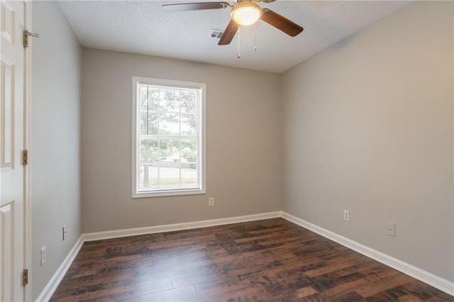 5069 Jonesboro Rd, Union City, GA 30291 - empty room featuring dark wood finished floors and ceiling fan