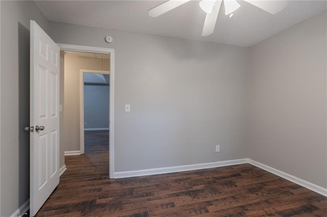 5069 Jonesboro Rd, Union City, GA 30291 - unfurnished room with dark wood-type flooring, ceiling fan, and a smoke detector