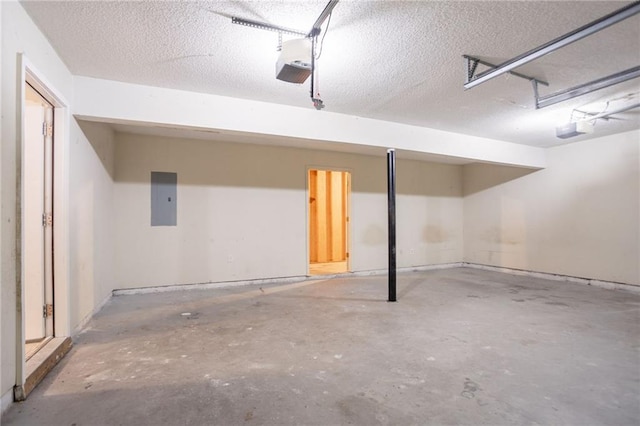 5069 Jonesboro Rd, Union City, GA 30291 - garage featuring electric panel and a garage door opener