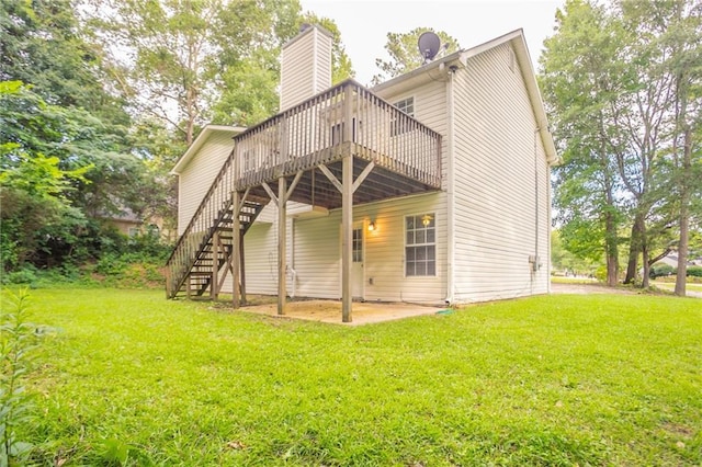 5069 Jonesboro Rd, Union City, GA 30291 - rear view of property with stairs, a wooden deck, a lawn, and a chimney