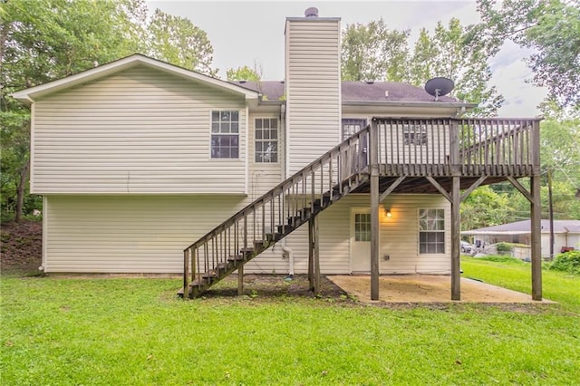 5069 Jonesboro Rd, Union City, GA 30291 - rear view of house featuring stairs, a wooden deck, a yard, and a chimney