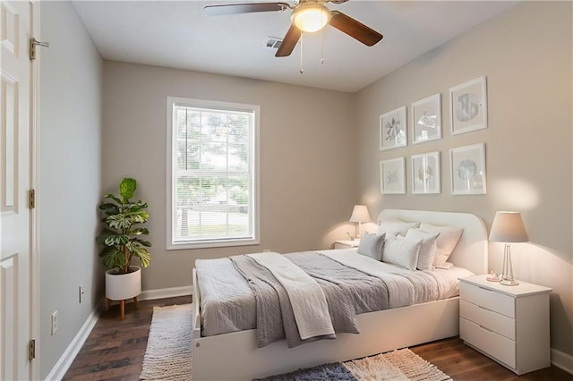5069 Jonesboro Rd, Union City, GA 30291 - bedroom featuring dark wood finished floors and a ceiling fan