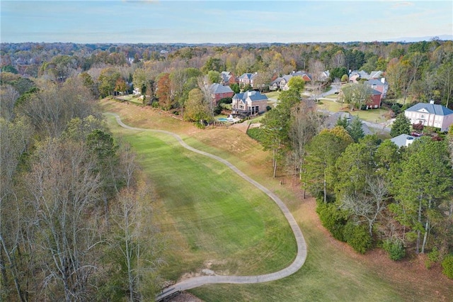 drone / aerial view with a view of trees